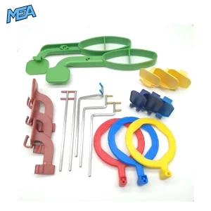 Dental X-ray sensor positioner kit with colour-coded aiming rings, indicator arms and bite blocks