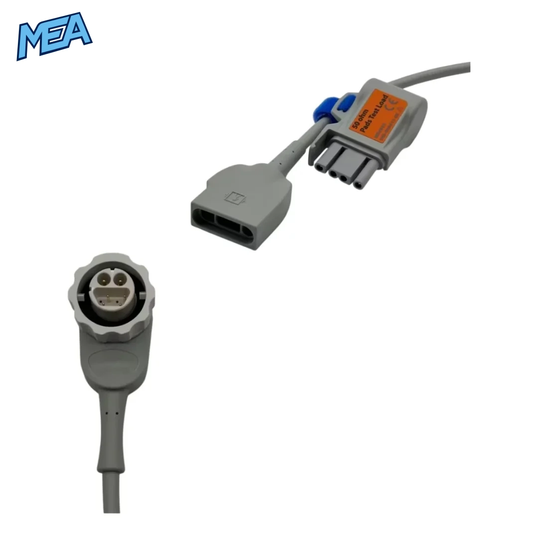 Close-up of original Mindray MR6701/MR6702 pads cable connectors — 3-pin pads plug, 50 ohm test load module, and circular defibrillator port connector